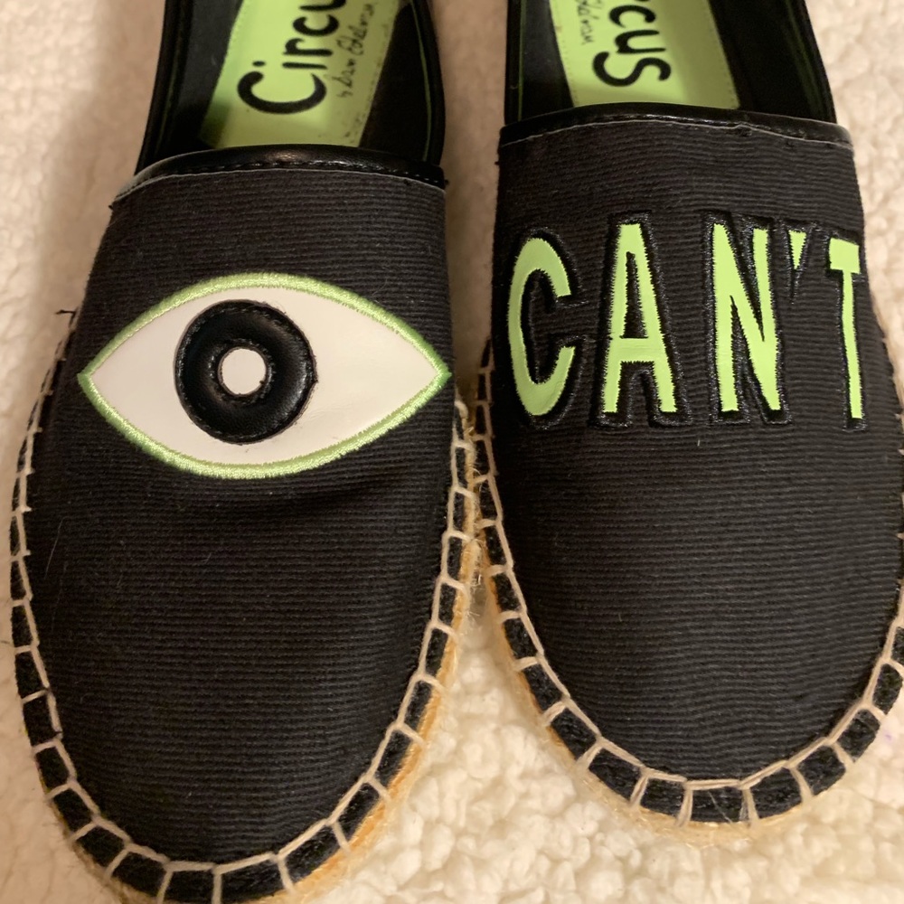 Circus by Sam Edelman Black Canvas Espadrille Slip-Ons with Neon Green Lettering